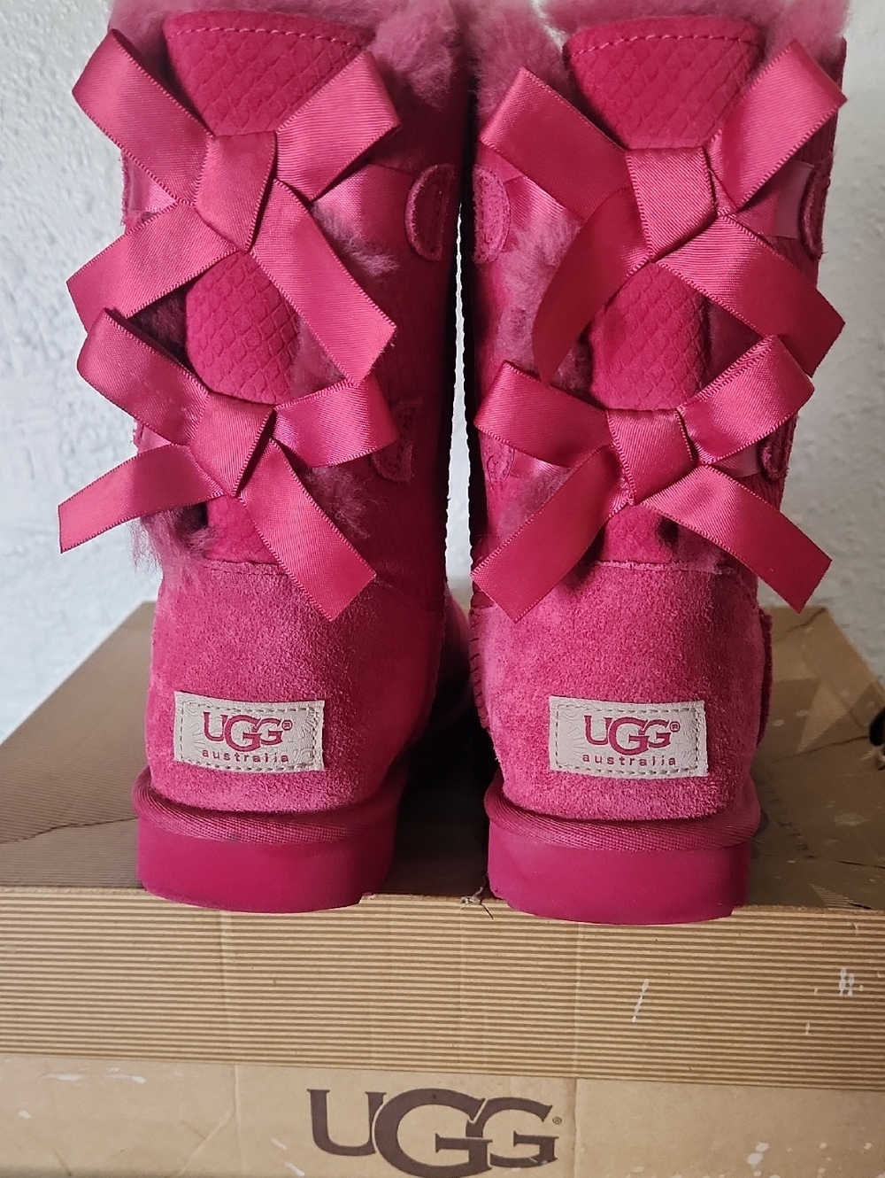 UGG Women's Hot Pink Suede Shearling Back-Bow Boots